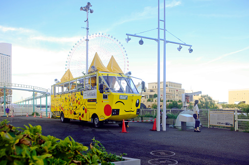 Yokohama, Kanagawa Prefecture, Japan - August 14, 2018: Performers dressed as Pikachu on board Pikachu amphibious bus during the 5th 