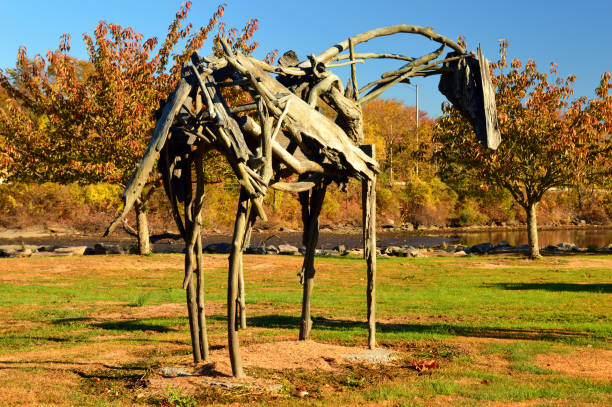 Greenwich, CT, USA October 27, 2013 Deborah Butterfield Valentine's sculpture Orson stands against autumn foliage in Bruce Park, Greenwich, Connecticut