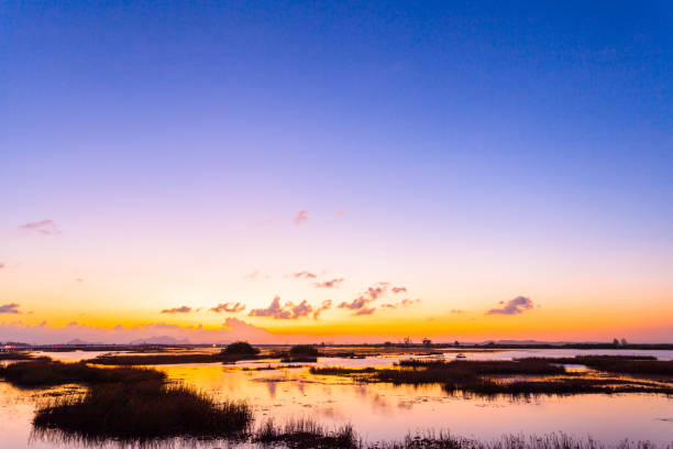 istock golden sunset above Thalay Noi lake 1019178928