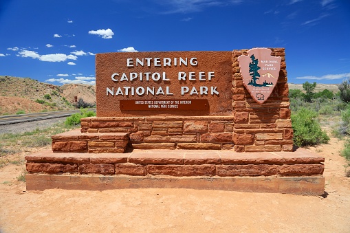 The entrance sign in the desert at Capital Reef National Park in Utah June 7, 2018