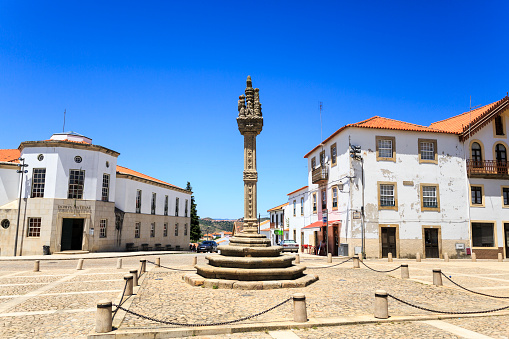 View of the sixteenth century gothic manueline style granite pillory in the town of Vila Nova de Foz Coa, Portugal