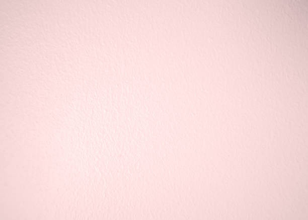 istock Pink pastel old rough cement texture background. 1019211504