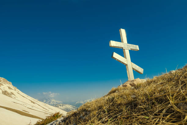 istock old christian cross on a hill slope 1019213822