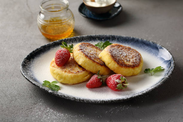 istock Cottage cheese pancakes with strawberries 1019216694
