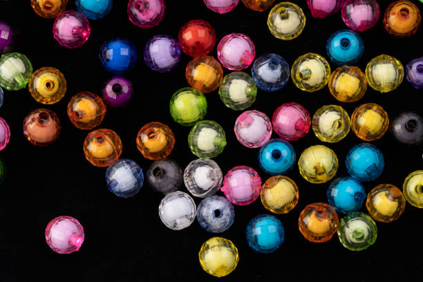 istock Beads, colorful beads on a black background. 1019220122