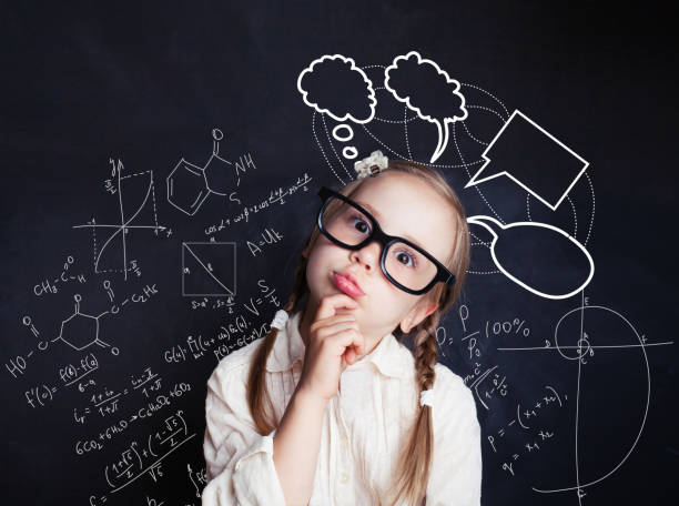 istock Thinking child with a school blackboard. Kids mathematics concept 1019220294