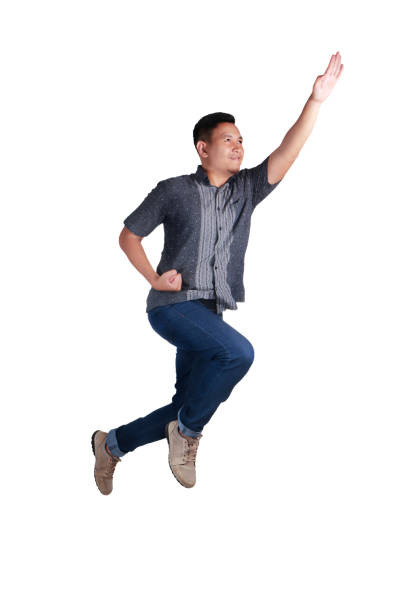 istock Levitation. Young Man Rising Flying Up 1019220448