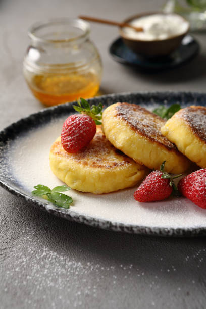 istock Breakfast cottage cheese pancakes, food close-up 1019220970