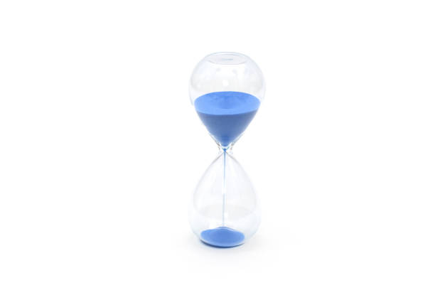 istock Isolated blue sand watch on white background 1019235082