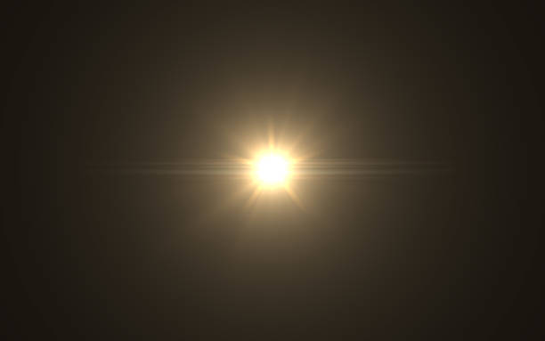 istock Abstract Lens Flare dusty with black background.Modern abstract beautiful rays light streak background.Gold sun light flare effect 1019242280
