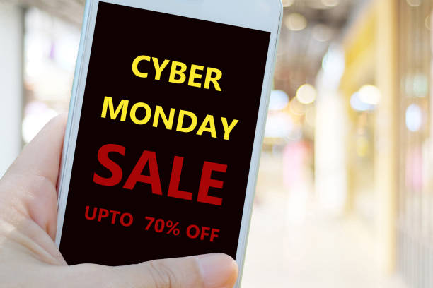istock Hand using smart phone with cyber monday sale on screen device over blur background, business technology and lifestyle concept 1019248146