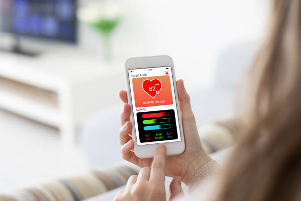 Female hands holding phone with app health tracking activity screen