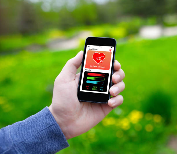 istock male hand holding phone with app health tracking activity screen 1019259726