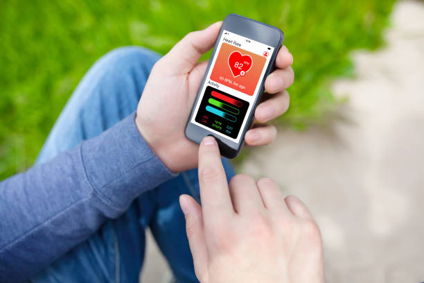 istock man holding phone with app health tracking activity screen street 1019259770