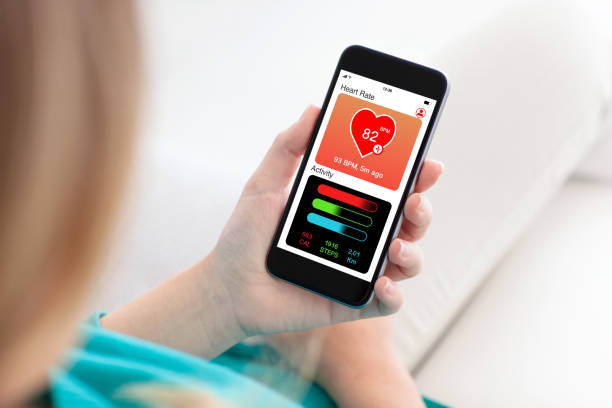 istock woman holding phone with app health tracking activity on screen 1019259802