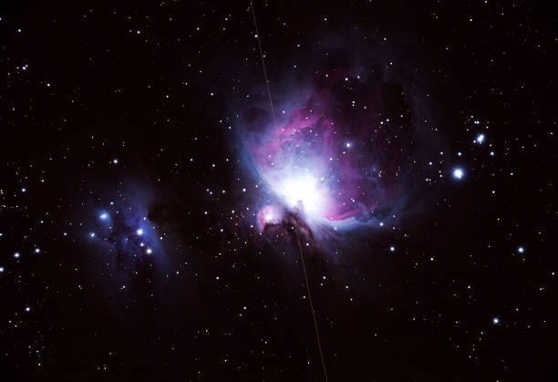 istock The Orion Nebula and satelite 1019271814