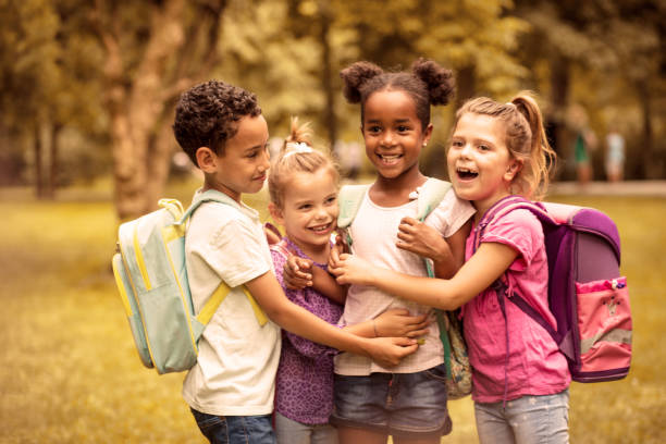 istock Lets hug and poses to camera. Children. 1019273996