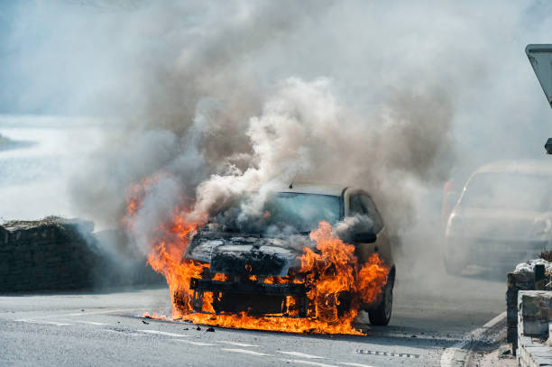 Car Fire, Machynlleth, Powys, West Wales Friday 18th March 2016 Machynlleth, Powys, West Wales Friday 18th March: A car on the A487 just off the Pont Dyfi Bridge caught fire due to a faulty starter motor at 14.20 this afternoon. The Machynlleth retained fire service responded quickly and got the fire under control within minutes of being on scene The young girl who's car it was, was visibley shaken up but even so she was more concerned about the houses and local people than herself or her car. © Veteran Photography machynlleth photos stock pictures, royalty-free photos & images