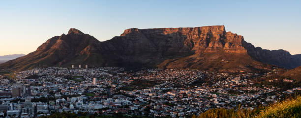 Table Mountain & Devil's Peak Sunrise from Signal Hill stock photo