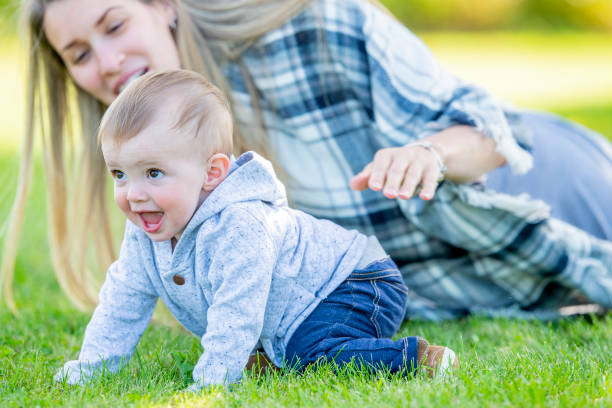 istock Baby crawling outdoors 1019287474