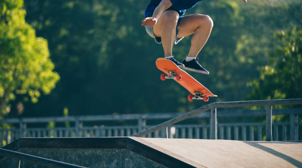 istock skateboarder skateboarding on skatepark ramp 1019287634
