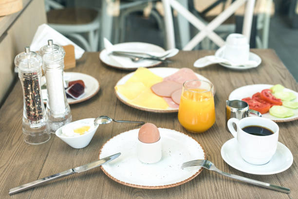 istock Continental breakfast of egg juice coffee and yogurt on the table. 1019290120