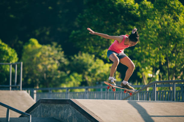 istock skateboarder skateboarding on skatepark ramp 1019290354