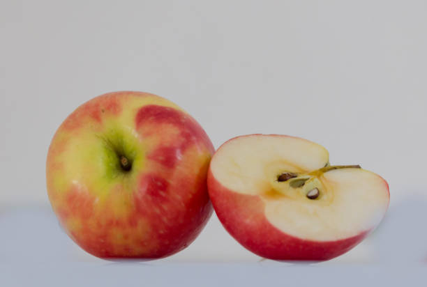 istock apple isolted in white red yellow, slice 1019290398