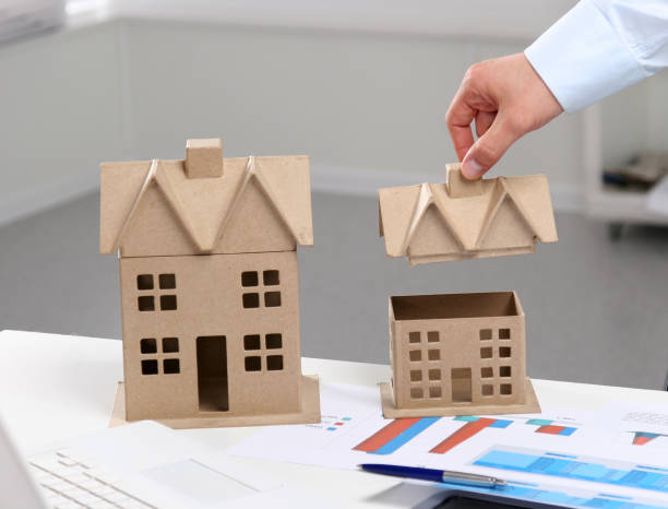 istock Image of new model house on architecture blueprint 1019302254