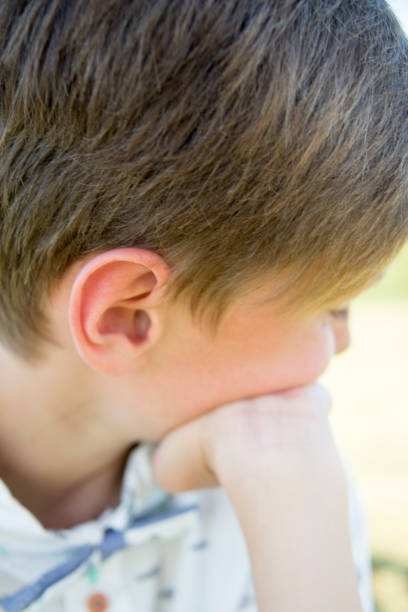istock teen boy spring portrait confirmation 1019309510