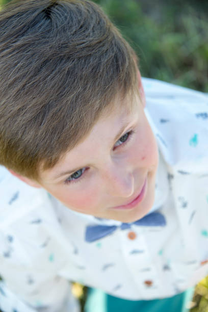istock teen boy spring portrait confirmation 1019309520