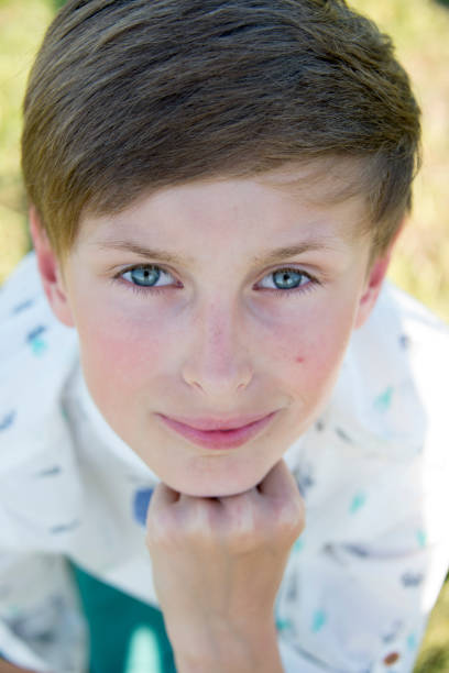istock teen boy spring portrait confirmation 1019309546