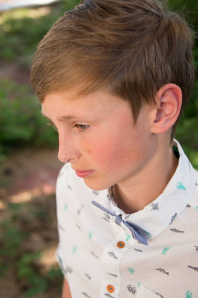 istock teen boy spring portrait confirmation 1019310002