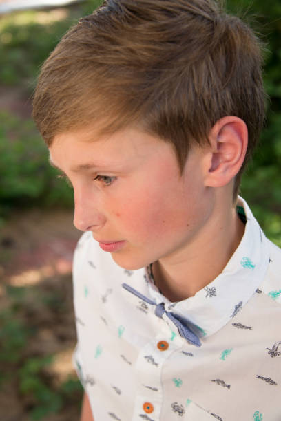 istock teen boy spring portrait confirmation 1019310014