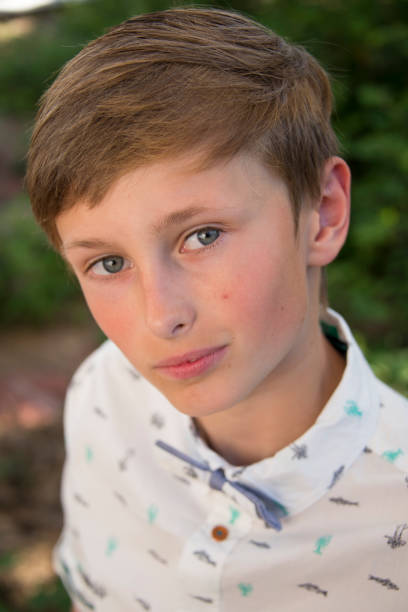 istock teen boy spring portrait confirmation 1019310020
