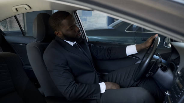 istock Upset tired businessman sitting in car, thinking about break-up, problems 1019312894
