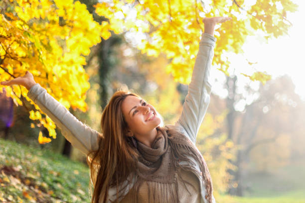 istock Happy woman in park 1019313790