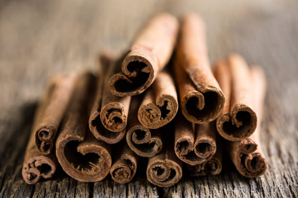 istock Cinnamon close-up on a wooden table 1019313966