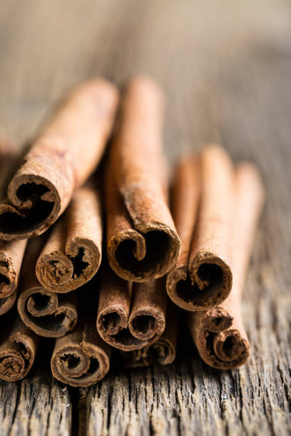 istock Cinnamon close-up on a wooden table 1019314026