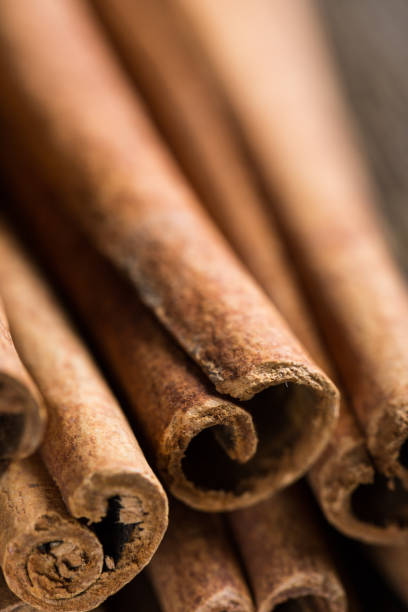 istock Cinnamon close-up on a wooden table 1019314262