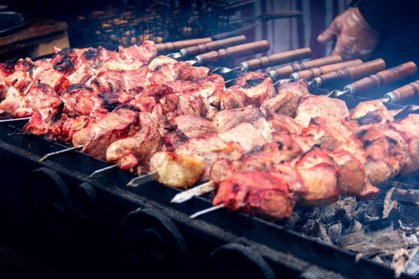 istock Preparation of meat on skewers 1019320776