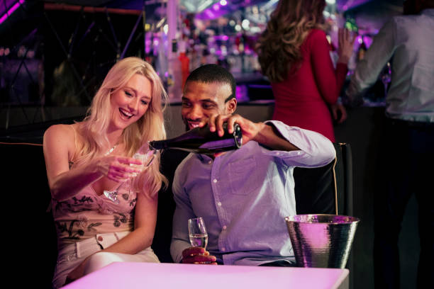 istock Pouring a Glass of Champagne 1019322902