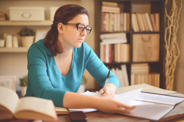 istock young woman working at home (literature) 1019355434