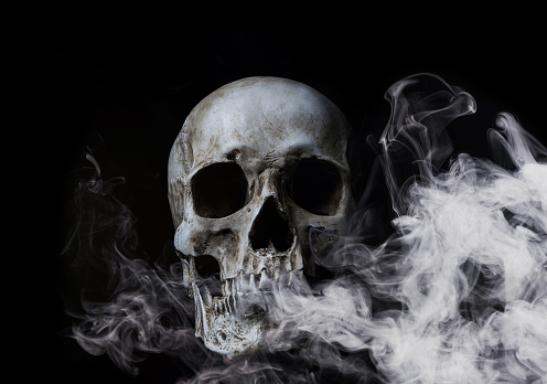 Skull surrounded by smoke