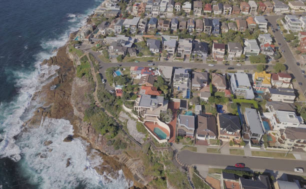 istock Houses next to ocean cliff 1019368528