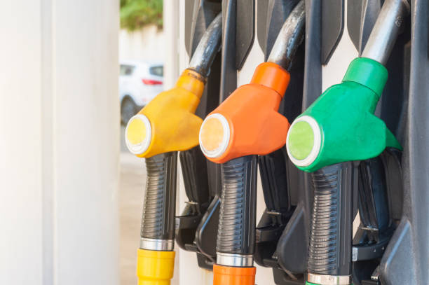 istock Fuel pumps hooked to the gasoline dispenser 1019368552