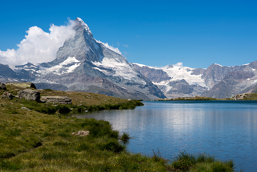 The Matterhorn from Stellisse lake in a day of good weather - Zermatt Switzerland