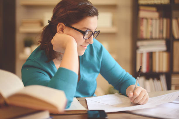 istock young woman working at home (literature) 1019378750
