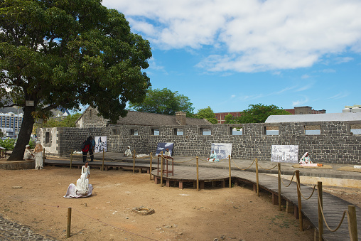Port Louis, Mauritius - December 01, 2012: Unidentified people visit Aapravasi Ghat, the historic Immigration Depot colonial building complex in Port Louis, Mauritius. It is UNESCO World Heritage Site.