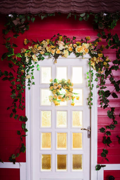 istock White door in red wooden house 1019384786